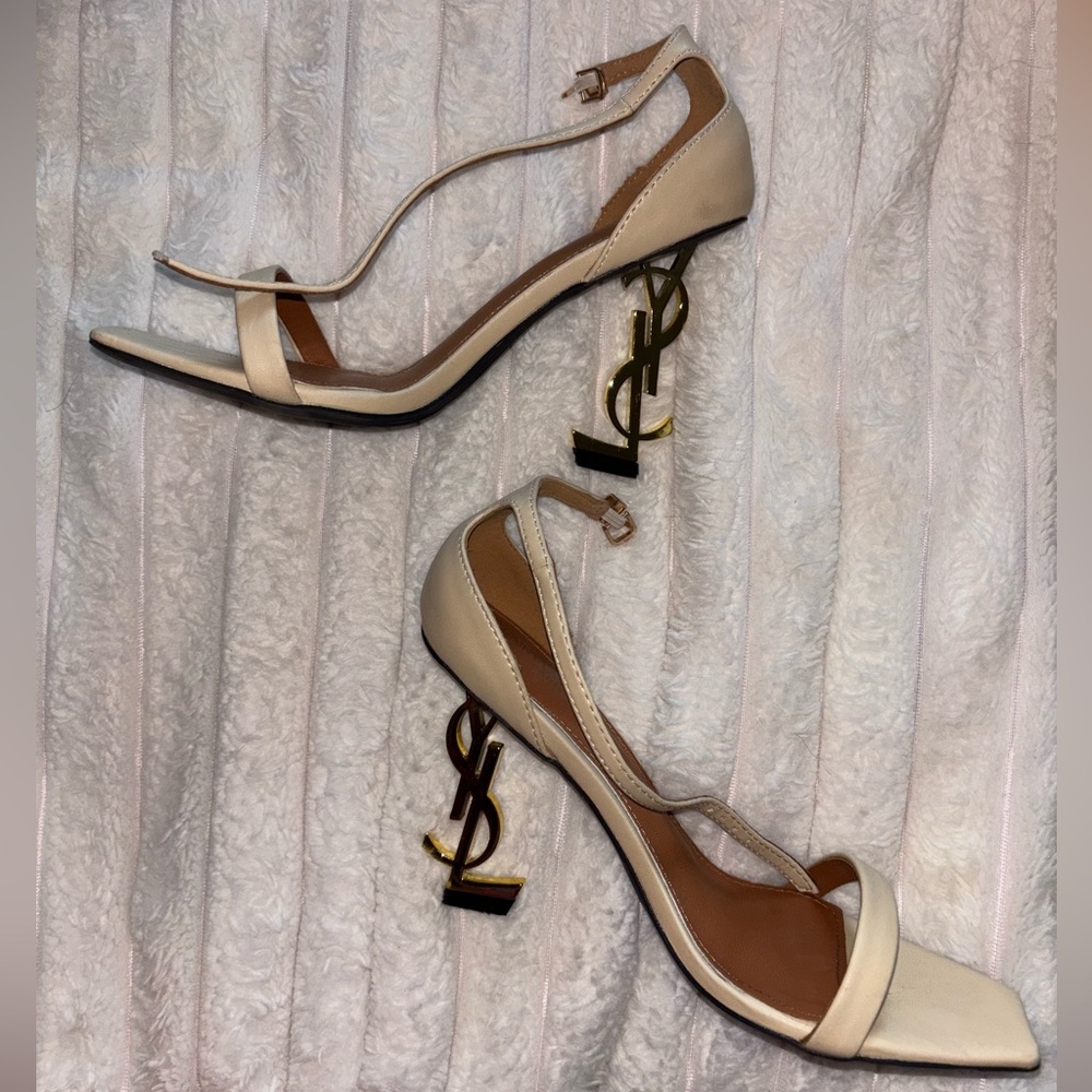 Saint Laurent Cream Heels with Gold Logo Accent